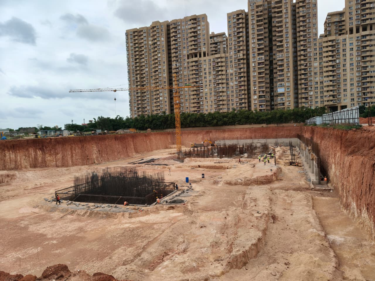 Wide view of excavation and foundation pours