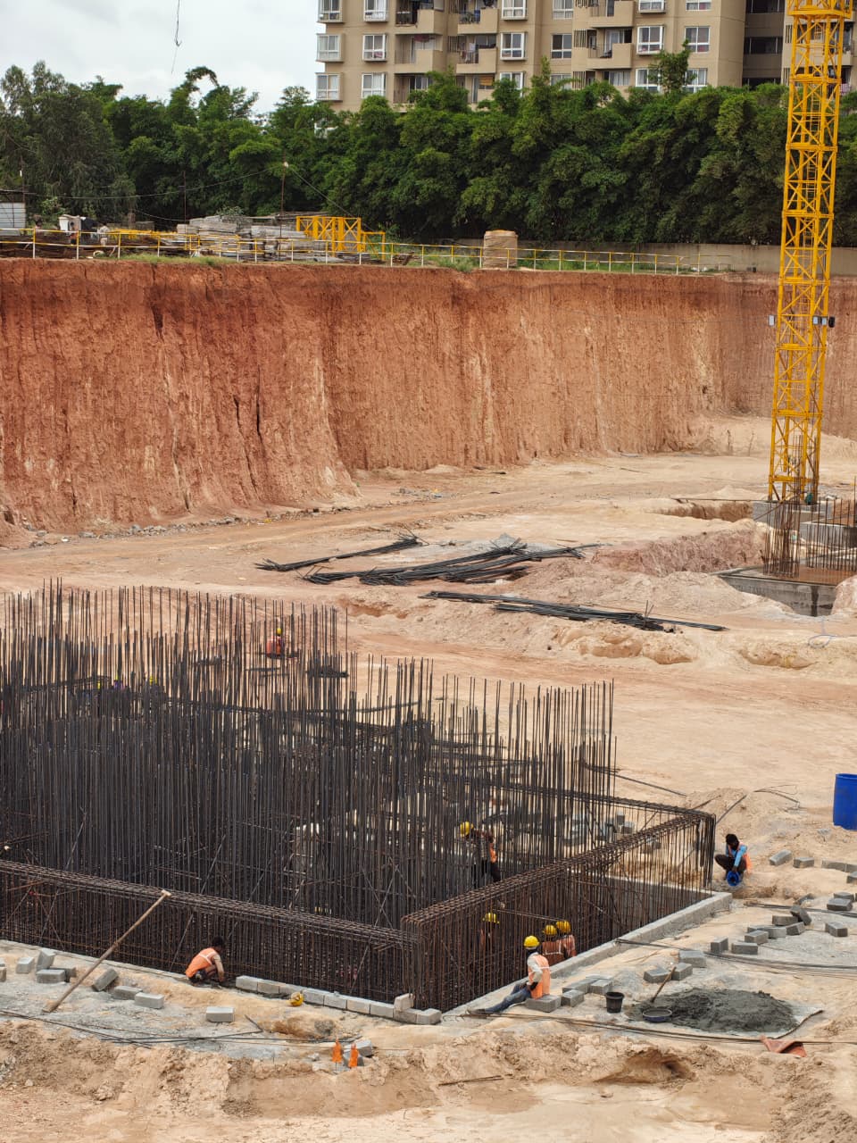 Foundation and rebar column construction with tower crane